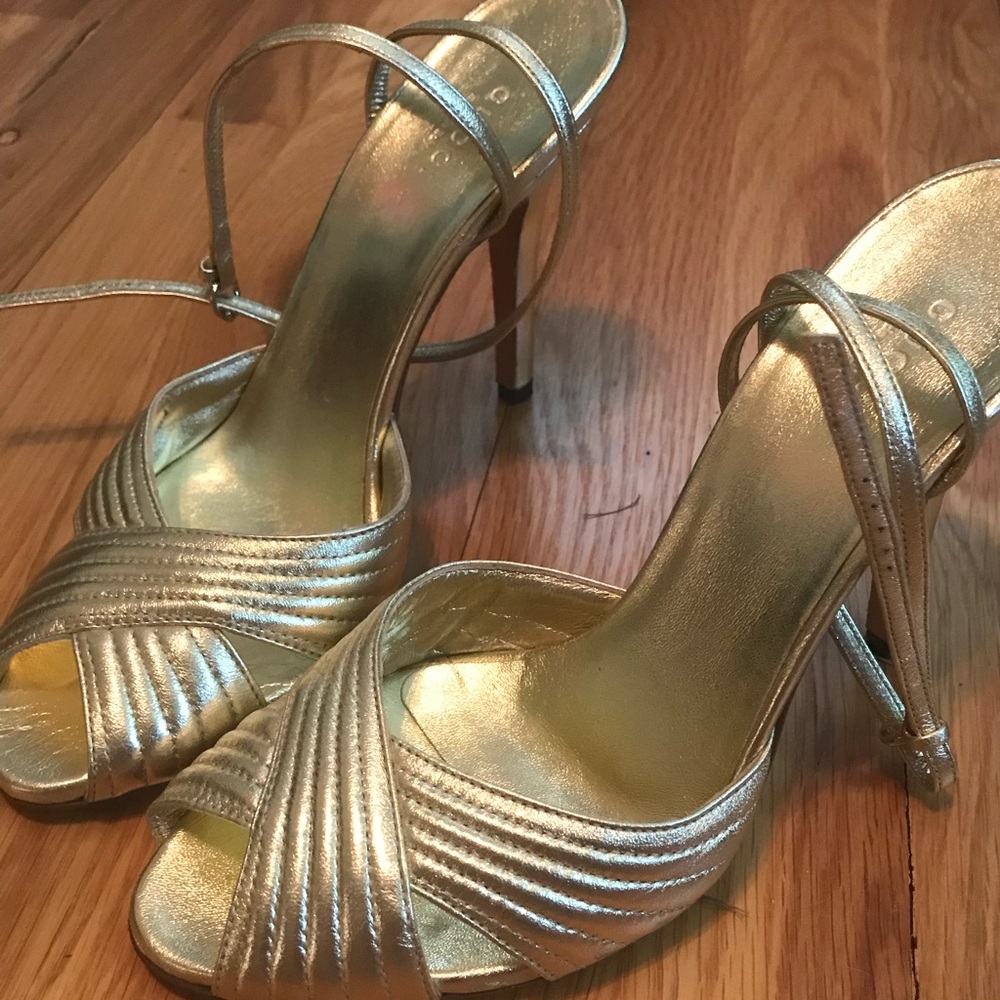 Gucci gold heels. Size 8 but fits US 7